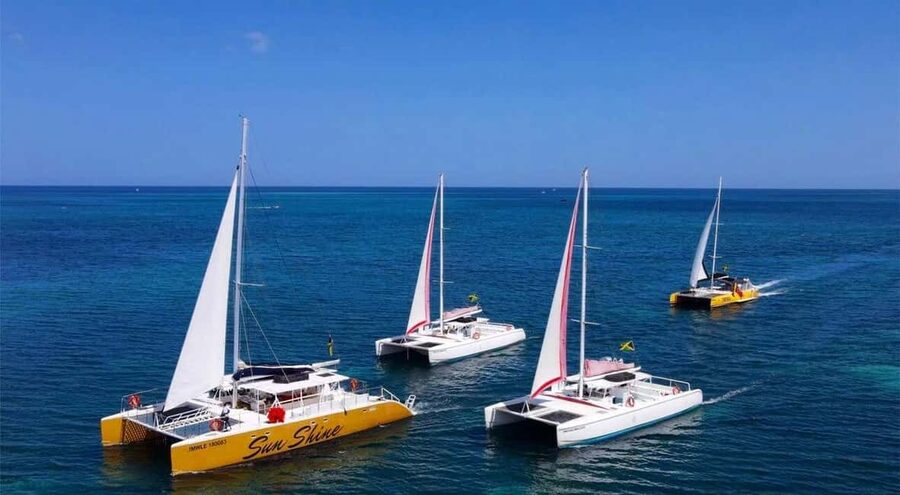 All Resorts: Ricks Cafe Sunset Catamaran Cruise - From your resort to Negril’s 7-mile Beach