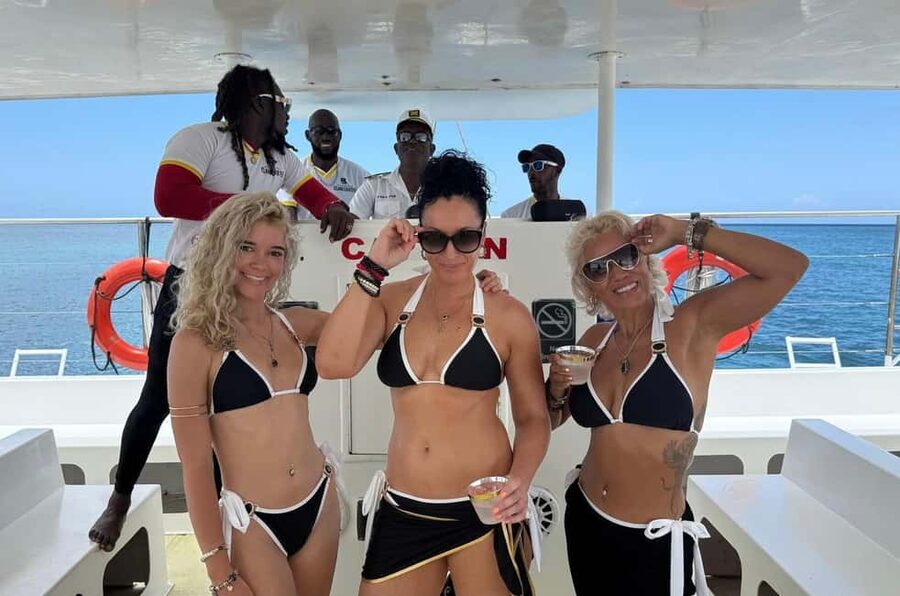 All Resorts: Ricks Cafe Sunset Catamaran Cruise - The coral reef stop after about an hour