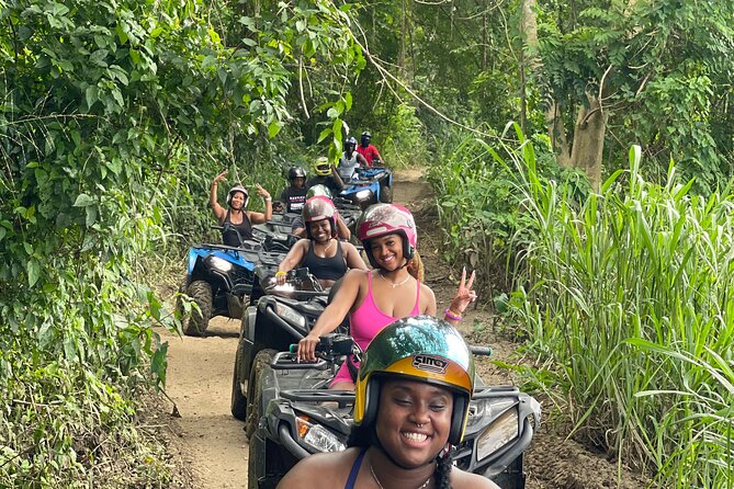 ATV and Bamboo Rafting with Transport from Montego Bay - The Lethe community and its bamboo rafts