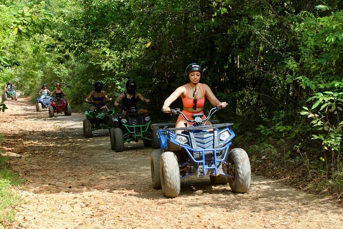 ATV, Bamboo Rafting, Horseback Ride n Swim Guided Tour - ATV riding up Snow Hill Mountain