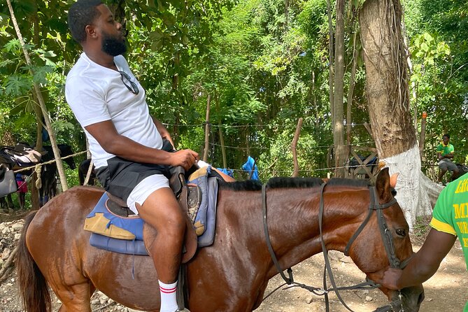 ATV, Bamboo Rafting & Horseback Riding from Montego Bay - Snow Hill Mountain: ATV riding, a rope swing, and Secret River