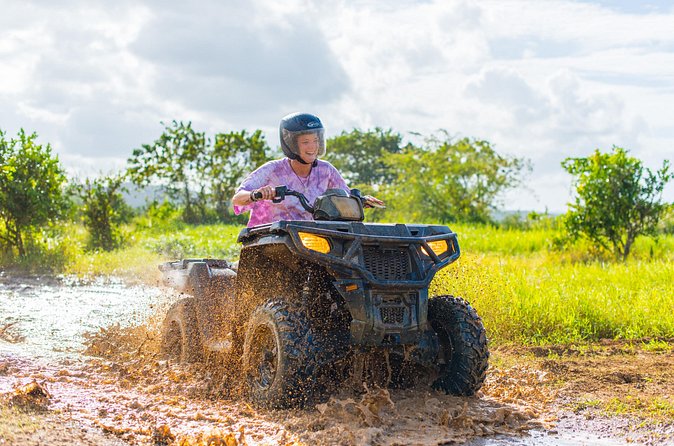 ATV, Horseback Ride, Zipline, Falls Climb + Lunch from Ocho Rios - ATV riding through Jamaica’s countryside