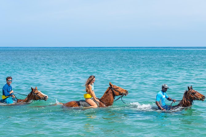 ATV, Horseback Ride, Zipline, Falls Climb + Lunch from Ocho Rios - Ziplining above the Dunn’s River area