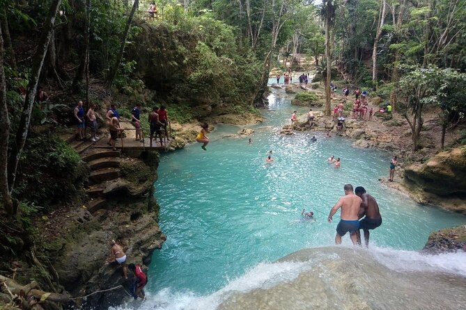 ATV, Horseback Riding, Bamboo Rafting & Blue Hole Tour Ocho Rios - Horseback riding into the Caribbean water