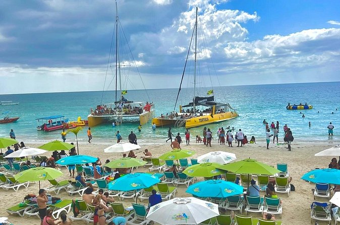 ATV Ride, Negril 7 mile Beach Catamaran Cruise & Ricks cafe Combo - Rick’s Cafe, cliffs, music, and sunset