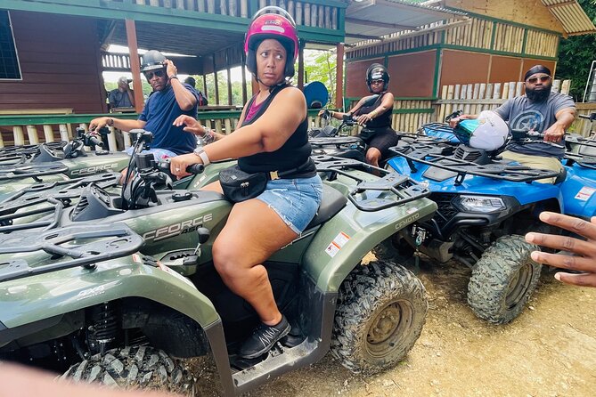 ATV Tour, Limestone Bamboo Rafting and Transportation - Sandy Bay, puddles, forest, and an ATV