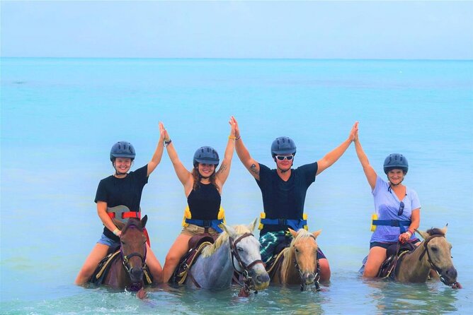 ATV, Zipline, Horseback, Bamboo Rafting & Catamaran Boat Jamaica - A catamaran cruise with music and snorkeling