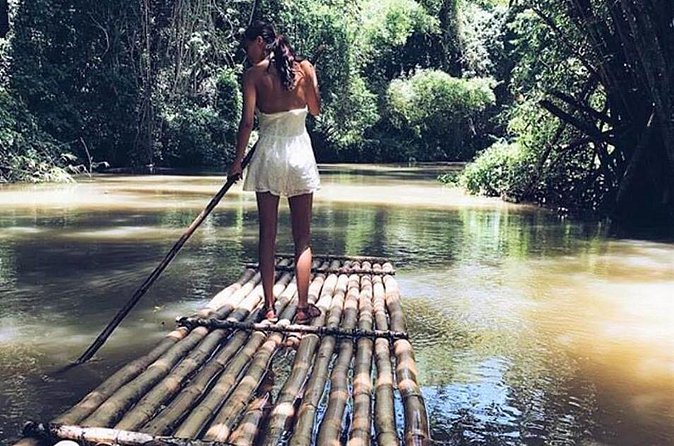 Authentic Jamaican Bamboo Rafting Tour from Montego Bay - Calm water, swimming, and shore breaks