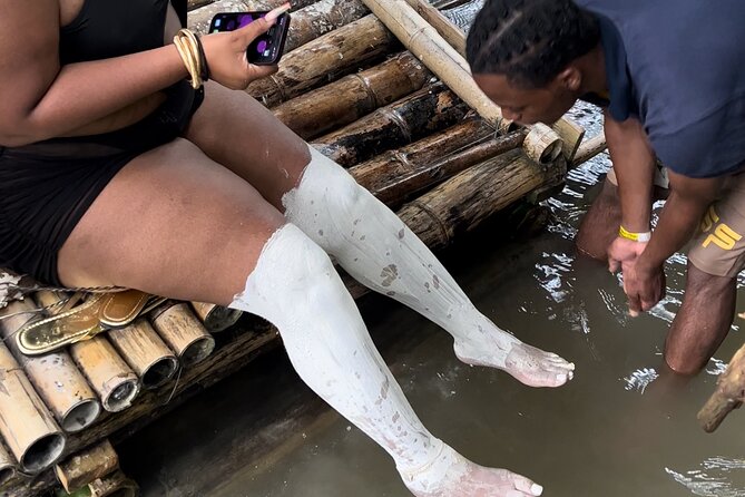 Bamboo Rafting and Foot Limestone Massage Tour in Montego Bay - Coconut, food, music, and river stops
