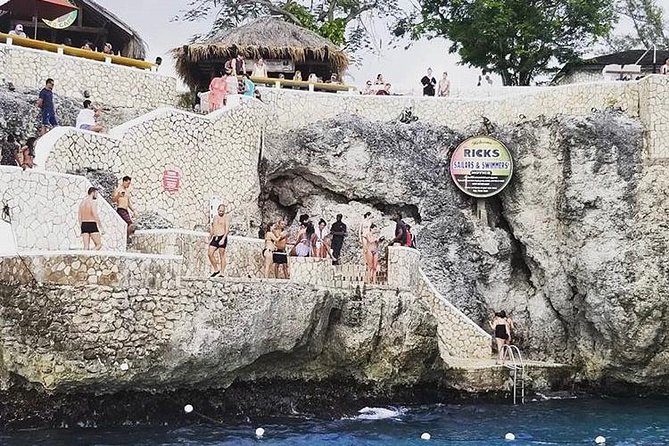 Bamboo Rafting and Limestone Foot Massage with Ricks Cafe Private Tour - Timing, pickup, and the real length of the outing