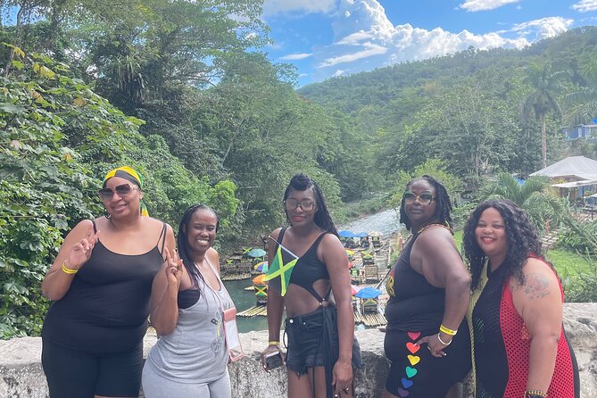 Bamboo Rafting with Limestone Foot massage then Margaritaville. - Jamaican food, drinks, and the Margaritaville stop