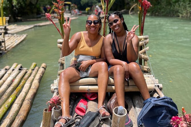 Bamboo Rafting with Limestone Massage from Montego Bay - Music, rum punch, coconut water, and floating food