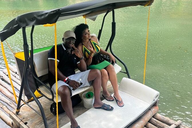 Bamboo River Rafting in Ocho Rios - Settling onto a shaded bamboo raft