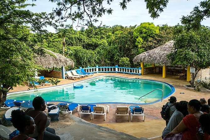 Blue Hole Mineral Spring and Rick's Cafe - Swimming in the 40-by-50-foot limestone pool