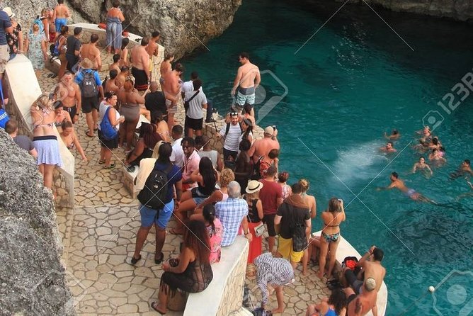 Blue Hole Mineral Spring Private Tour With Ricks Cafe - Rick’s Cafe For Cliff Jumps And Sunset