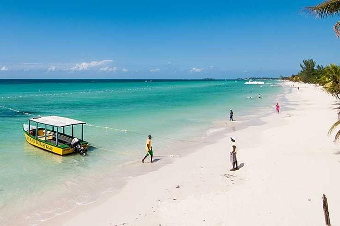 Blue Hole Mineral Spring, Ricks Cafe, 7 Mile Beach and Shopping Private Tour - Times Square Shopping Mall: an hour of practical browsing