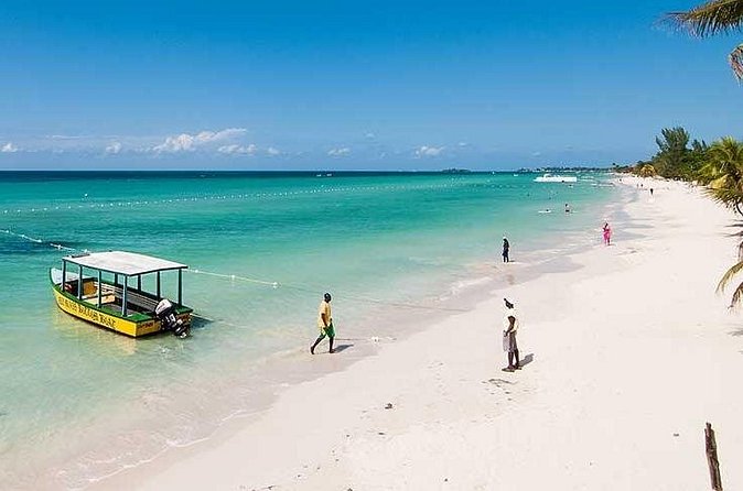 Blue Hole Mineral Spring, Ricks Cafe, 7 Mile Beach and Shopping Private Tour - The value of $129 per person