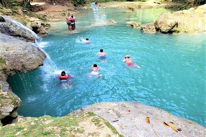 Blue Hole & Secret Falls Day-Trip with Shopping from Grand Palladium - The short forest walk to Secret Falls