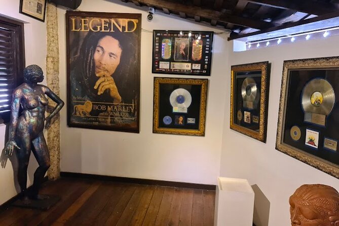 Bob Marley Mausoleum - Nine Mile Private Tour Ocho Rios Jamaica - Inside the museum: guitars, costumes, and awards