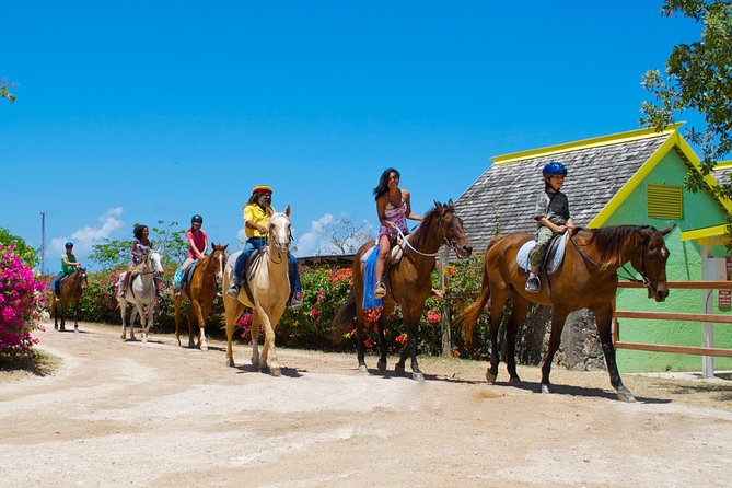 Braco Stables Horseback Ride & Swim Excursion from Ocho Rios - Riding through farmlands near Braco Estate