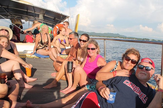 Catamaran Cruise Full Day Tour to Reef, Caves and Negril Beach - Boarding the catamaran means getting wet