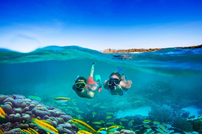 Catamaran Party Cruise and Snorkeling from Montego Bay - Snacks, open bar, and the onboard DJ