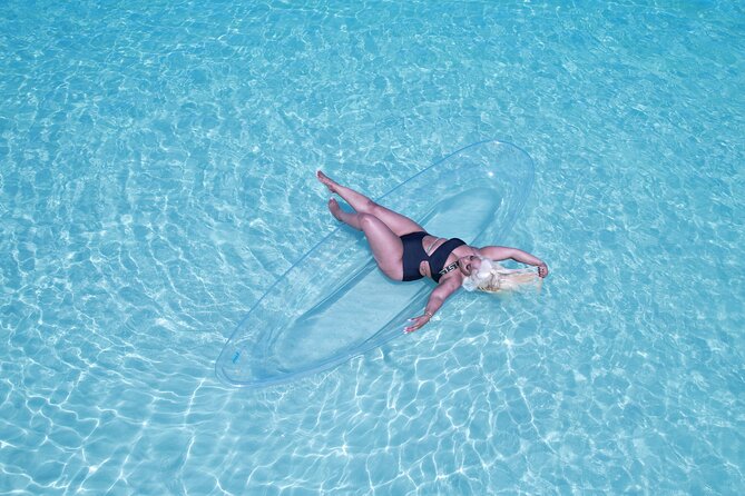 Clear Kayak Drone Video & Photoshoot in Montego Bay - Getting settled inside the transparent kayak
