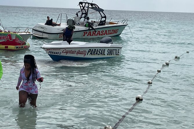 Customized Parasailing & JET-SKI - Taking the small boat to the parasailing vessel