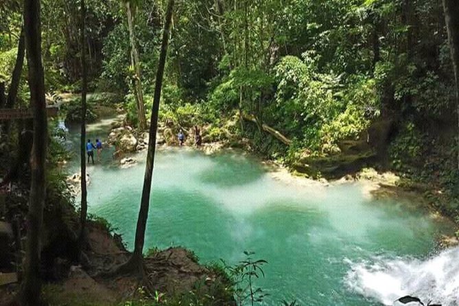Dunn's River Falls and Blue Hole Combo Tour From Ocho Rios & Runaway Bay - Climbing Dunn’s River Falls from the beach