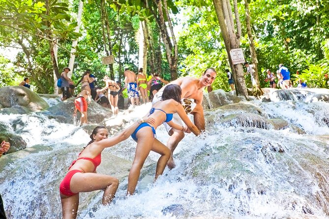 Dunn's River Falls and Luminous Lagoon Guided Tour from Grand Palladium - What to pack for a wet, active afternoon