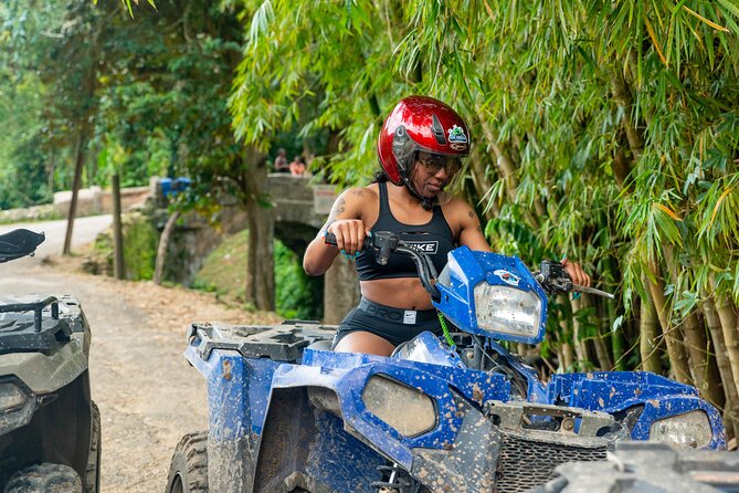 Dunn's River Falls, ATV, Horseback Ride and Bamboo Rafting Tour - ATV riding through rainforest and Snow Hill Mountain