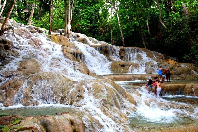 Dunn's River Falls + Bamboo Rafting With Limestone Foot Massage - Rose Hall and Greenwood on the road