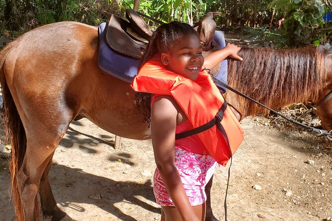 Dunn's River Falls Climb, Zipline and Horseback Riding Private Tour - Ziplining over the canopy