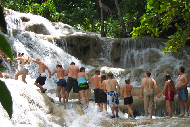 Dunn's River Falls & Luminous Lagoon Guided Tour from Montego Bay - Climbing Dunns River Falls for two hours