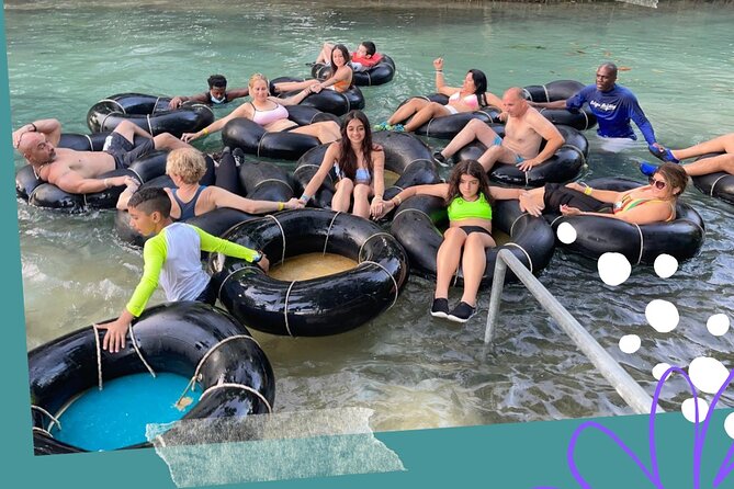 Dunn's River Falls, River Tubing, and Horseback Riding With Transportation - White River tubing through bamboo groves