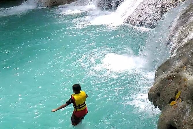 Dunns River Falls & Blue Hole Combo from Montego Bay with Pick Up - Lunch at a Jamaican jerk center