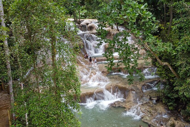 Dunns River Falls, Rafting, Zipline & Horseback from Montego Bay - Scotchies Drax Hall for Jamaican jerk food