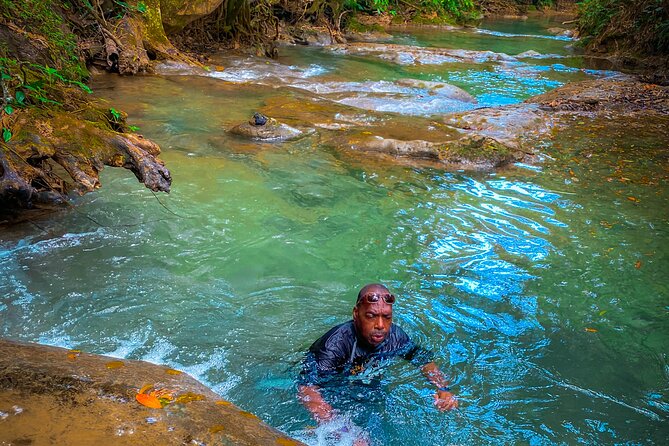 Explore 2 Hidden Water Falls and Caves with Limestone Massage - Border Jerk brings a short, useful food stop