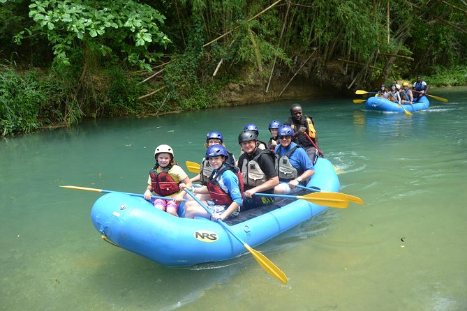 Falmouth Waterfalls Rafting and Beach Adventure - Guides make the river section work