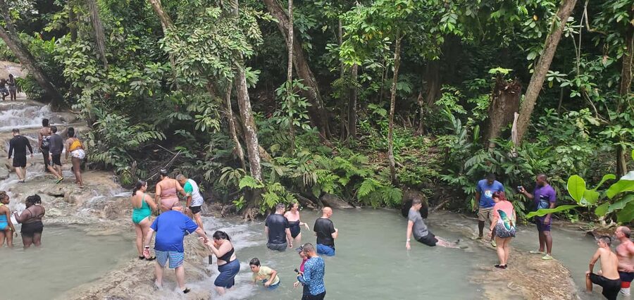 From Montego Bay: Dunn’s River Falls Experience - White sand, turquoise water, and a slower hour