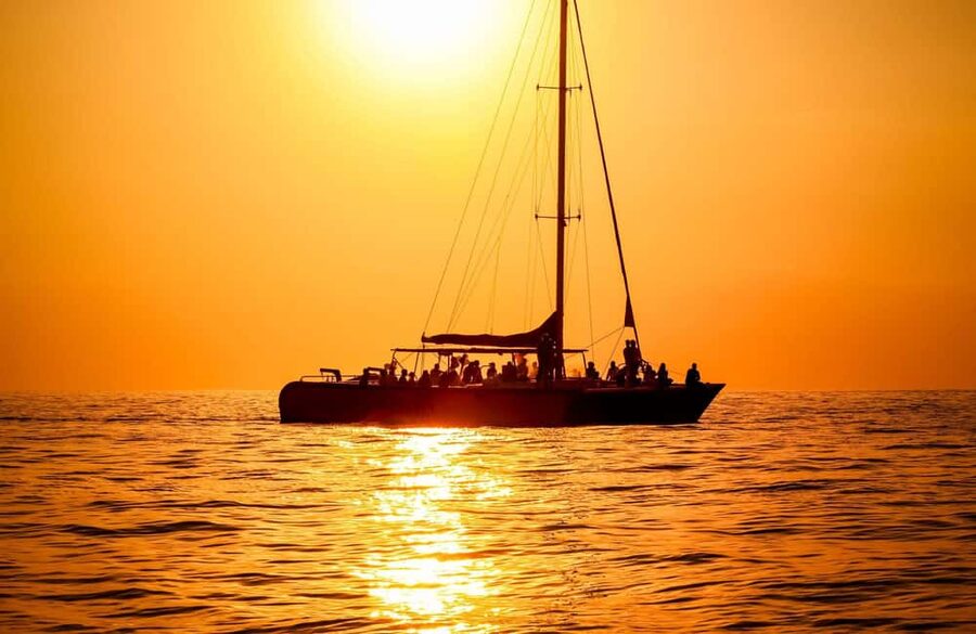 From Montego Bay/Falmouth: Negril Beach Catamaran Cruise - Rick’s Cafe and the Negril cliff setting