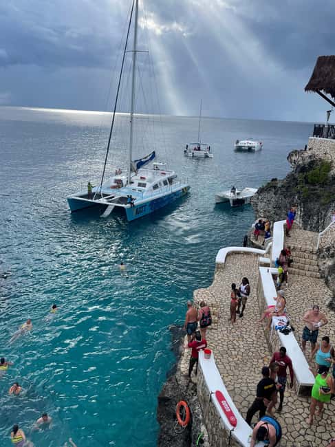 From Montego: Blue Hole Mineral Spring and Rick's Cafe Tour - Swimming, Hiking, and Time at the Spring