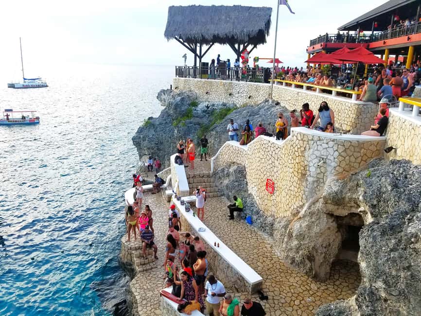 From Runaway Bay: Negril Beach and Rick's Cafe Trip by Van - Moving from sand to the West End cliffs