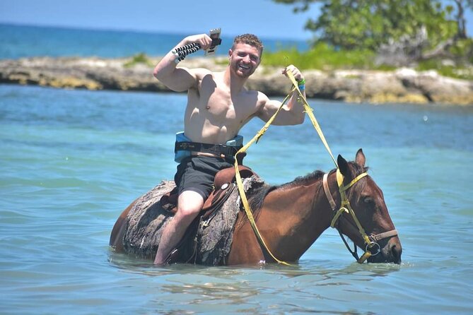 Full Day Private ATV with Zipline and Horseback Riding in Negril - Ziplining over brilliant Caribbean water