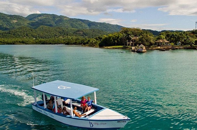 Glass bottom Boat Tour and Snorkeling Experience in Montego Bay - Feeding fish by hand