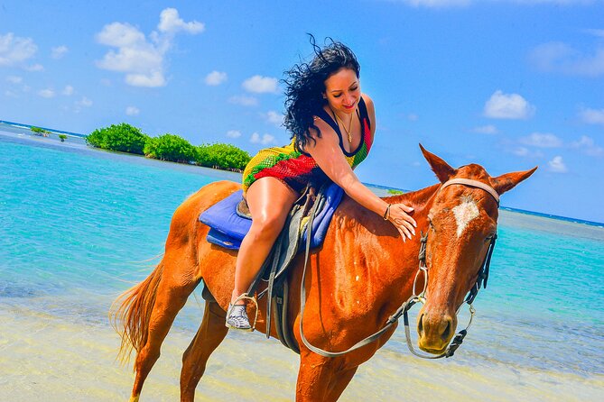 Horseback Ride and Swim Experience Montego with Transportation - Riding into the water with your horse