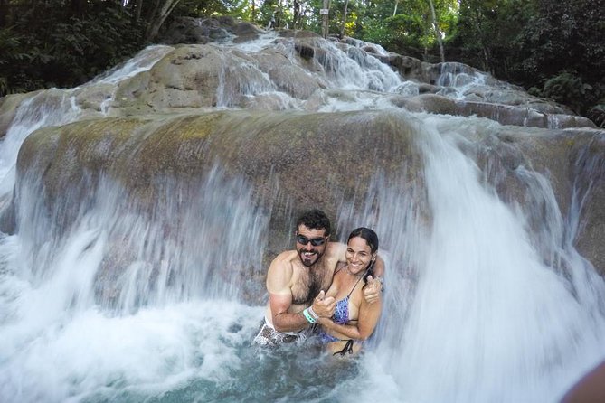 Jamaica Combo Tour: Dunn's River Falls and Bob Marley’s Nine Mile - Climbing Dunn’s River Falls from beach to summit