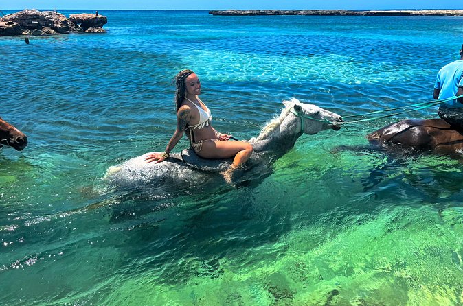 Martha Brae Bamboo River Rafting & Horse Back Riding Private Tour - Weather, cancellation, and planning details
