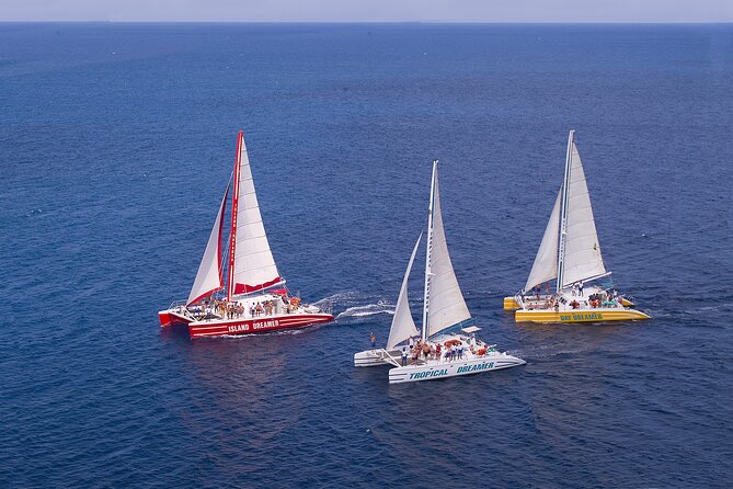 Montego Bay Catamaran: Snorkel Tour with Open Bar & Reggae DJ - Cruising Montego Bay with reggae and Soca