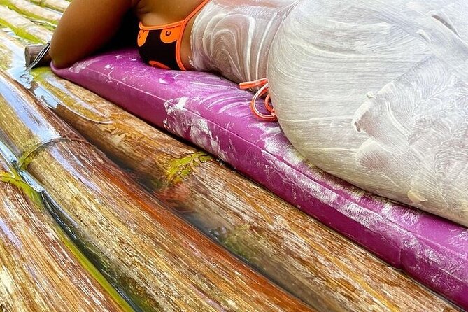 Montego Bay Rafting, Hip-Strip Shopping & Margaritaville Tour - A hand-made bamboo raft on the Great River